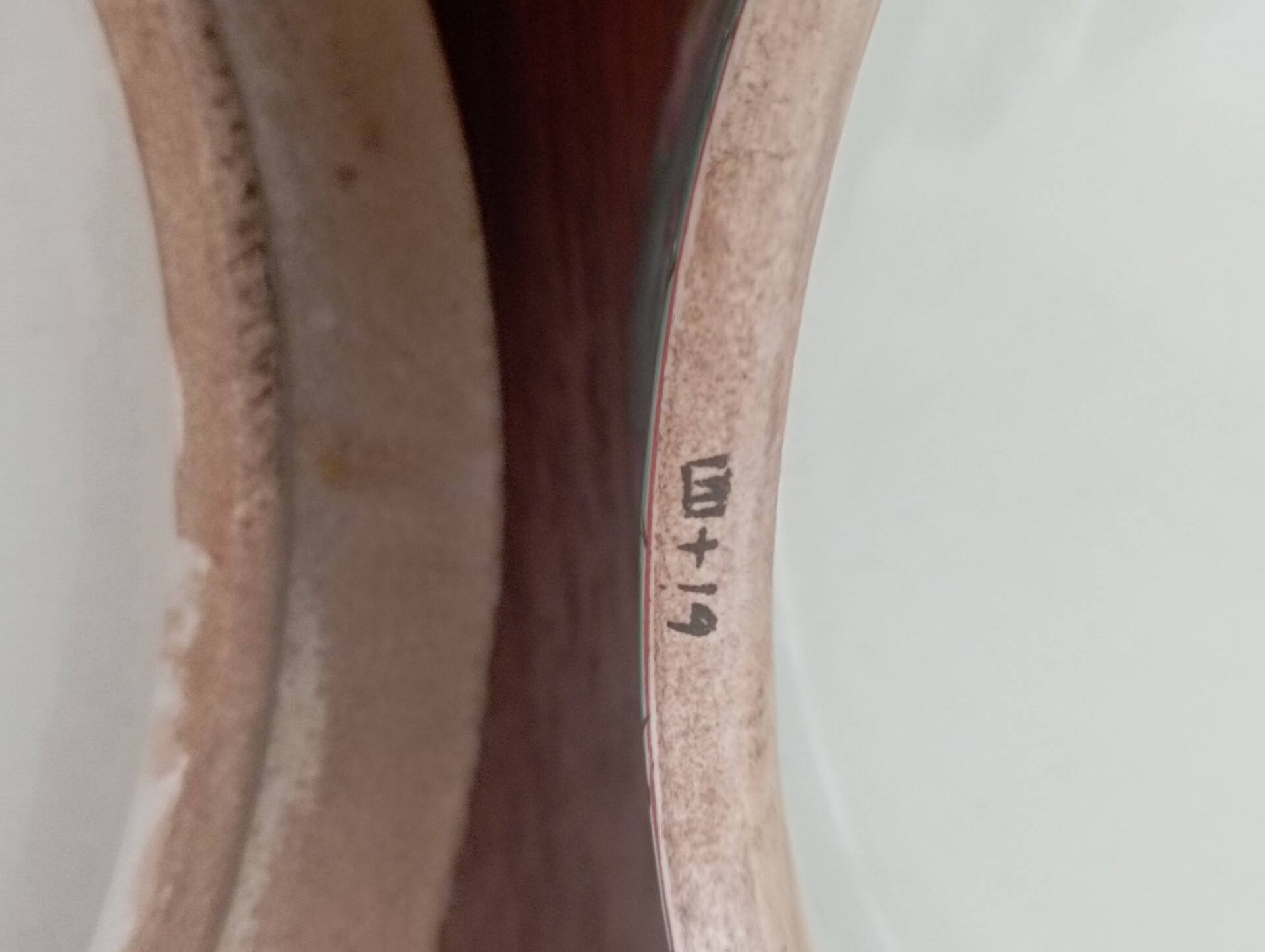 Old glazed ceramic covered pot