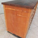 Workshop furniture with drawers and curtain in beech and walnut.