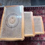 Vintage nesting tables in wood and cane – perfect condition.