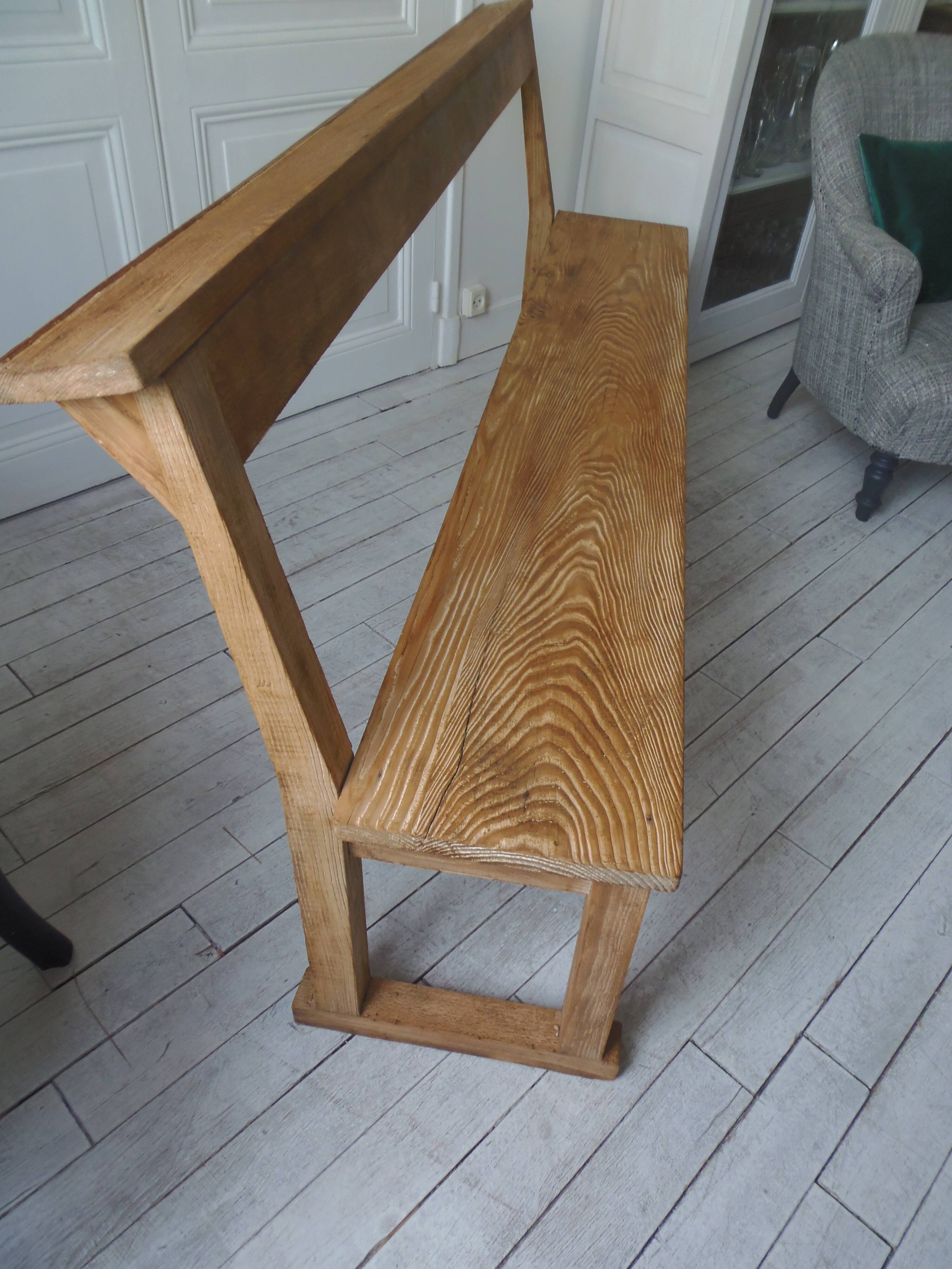 Church bench, bed end in pitch pine with light oak wax finish.