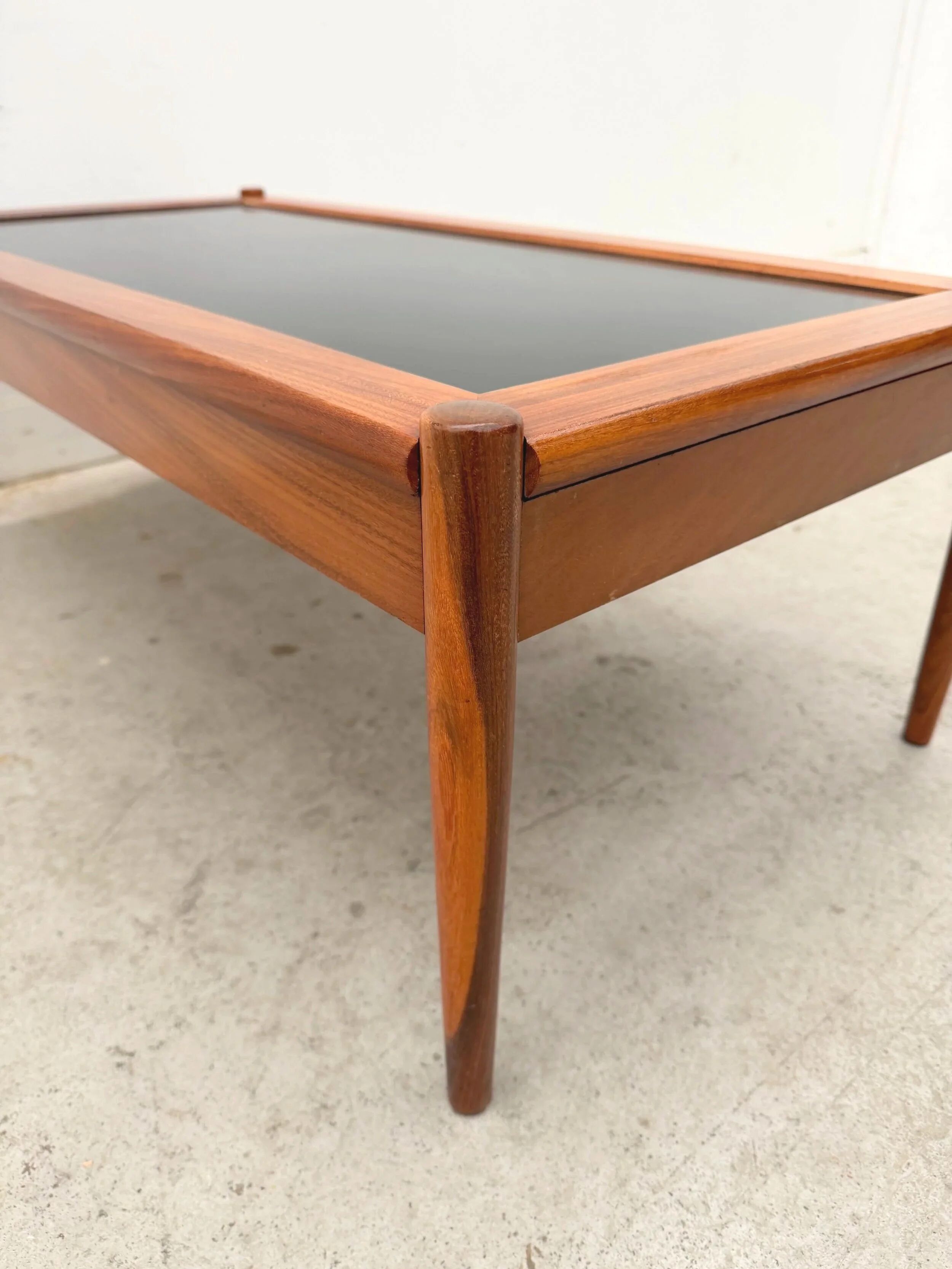 Scandinavian coffee table in teak and black formica, 1960.