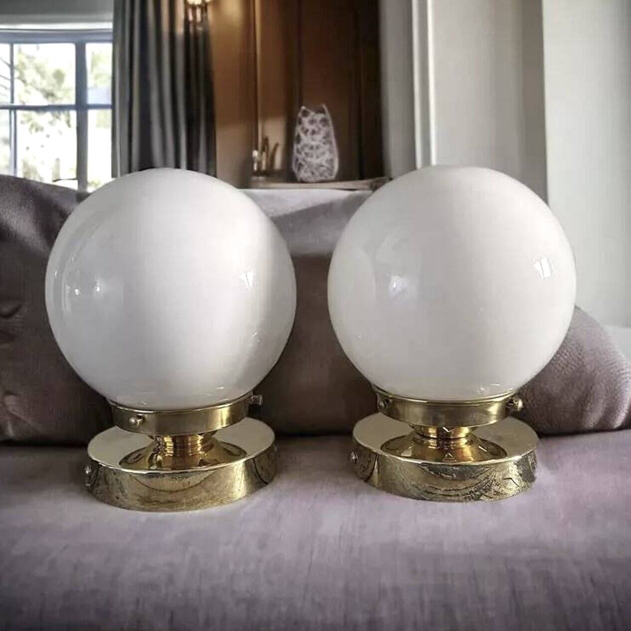 Pair of white opaline globe wall lights