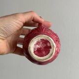 Red ceramic milk jug