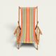 Vintage striped multicoloured deck chair with original patina.