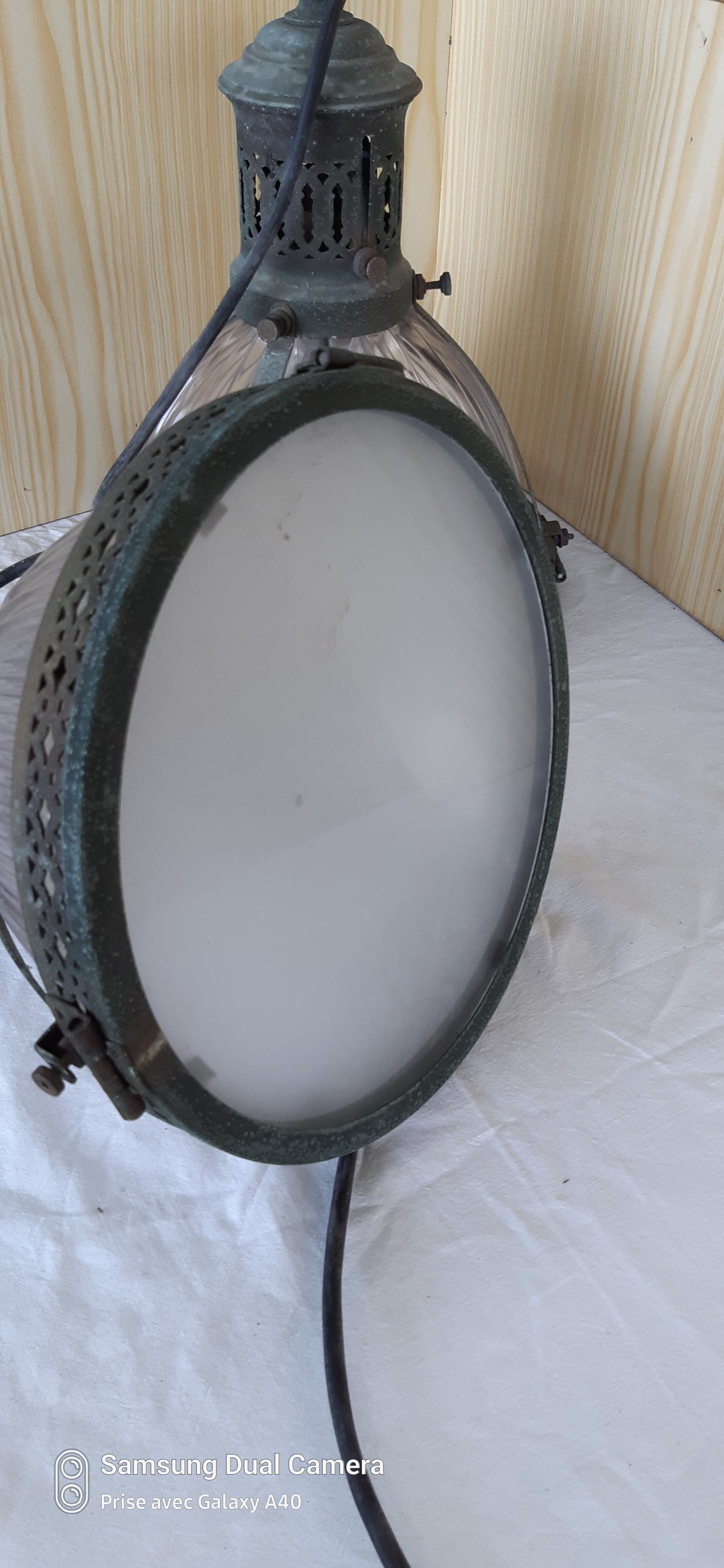 2 holophanous industrial lamps