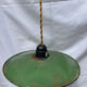 Old green and white enamelled sheet metal suspension