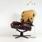 Fauteuil de salon pivotant vintage en palissandre et cuir design danois rétro années 70