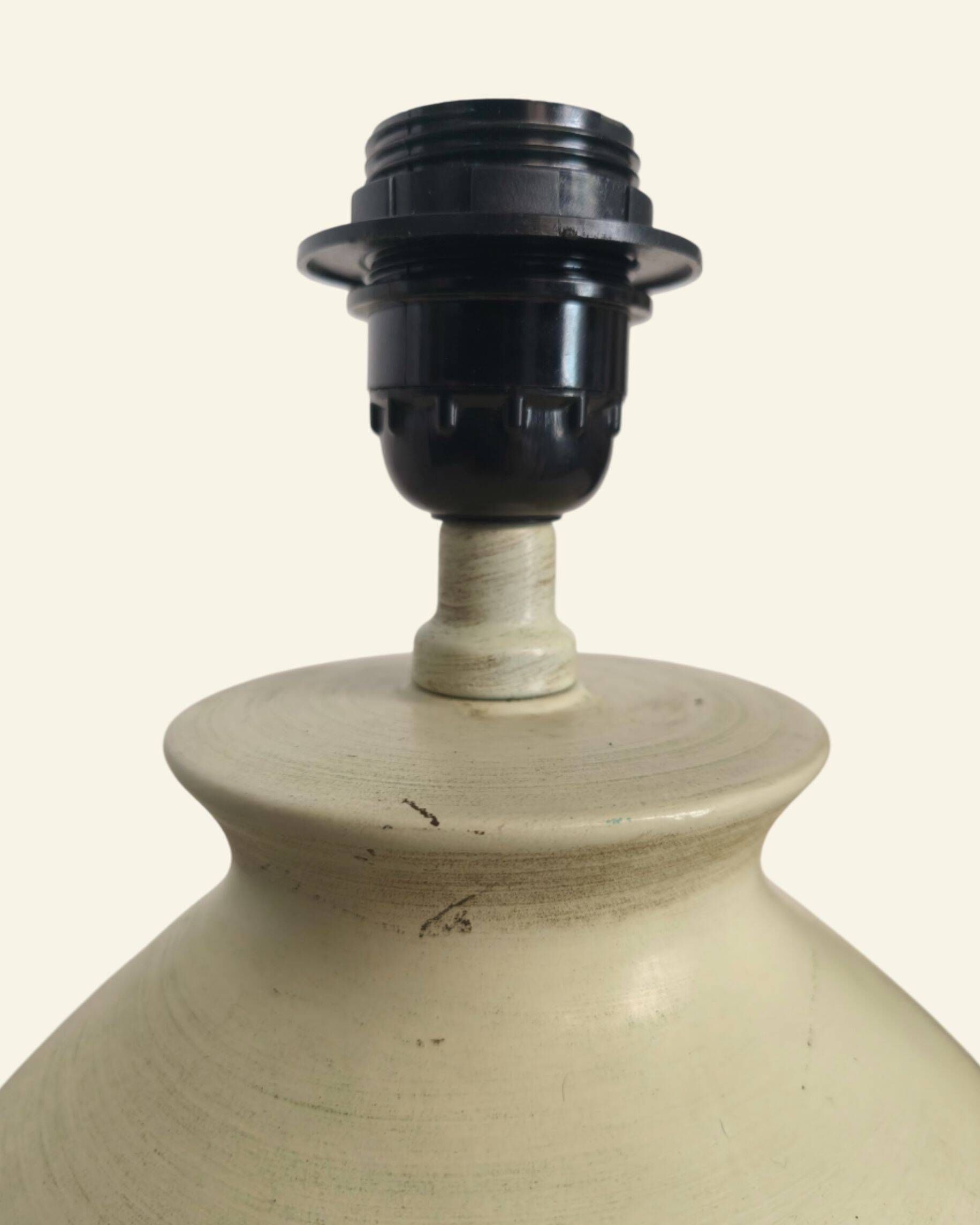 Ceramic lamp base turned in sand colour, organic shape.