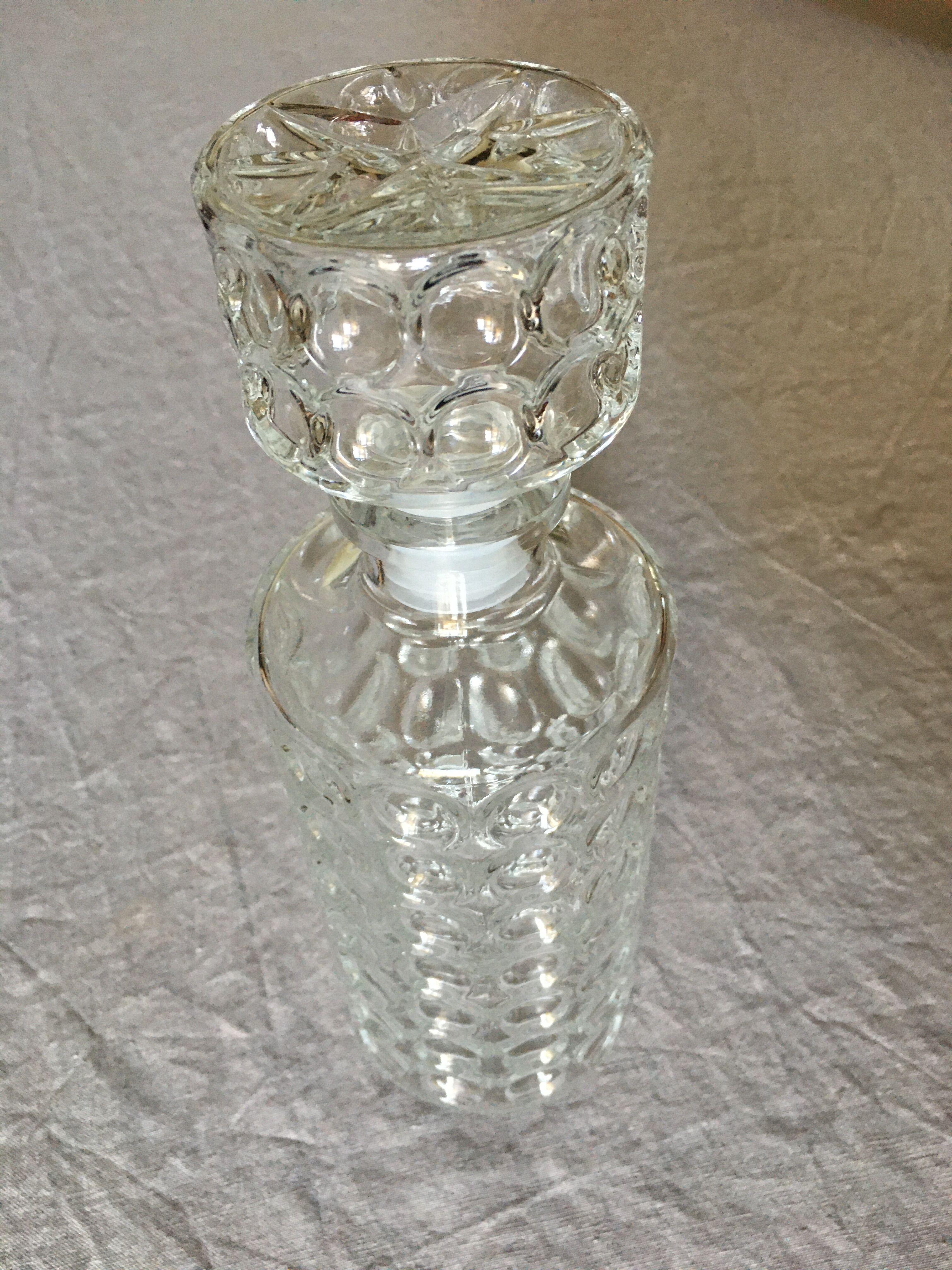 Vintage whisky carafe in transparent glass