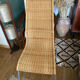 Trio of vintage Ikea rattan and aluminum chairs