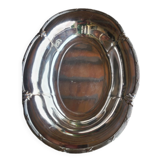 Hollow oval plate in silver metal