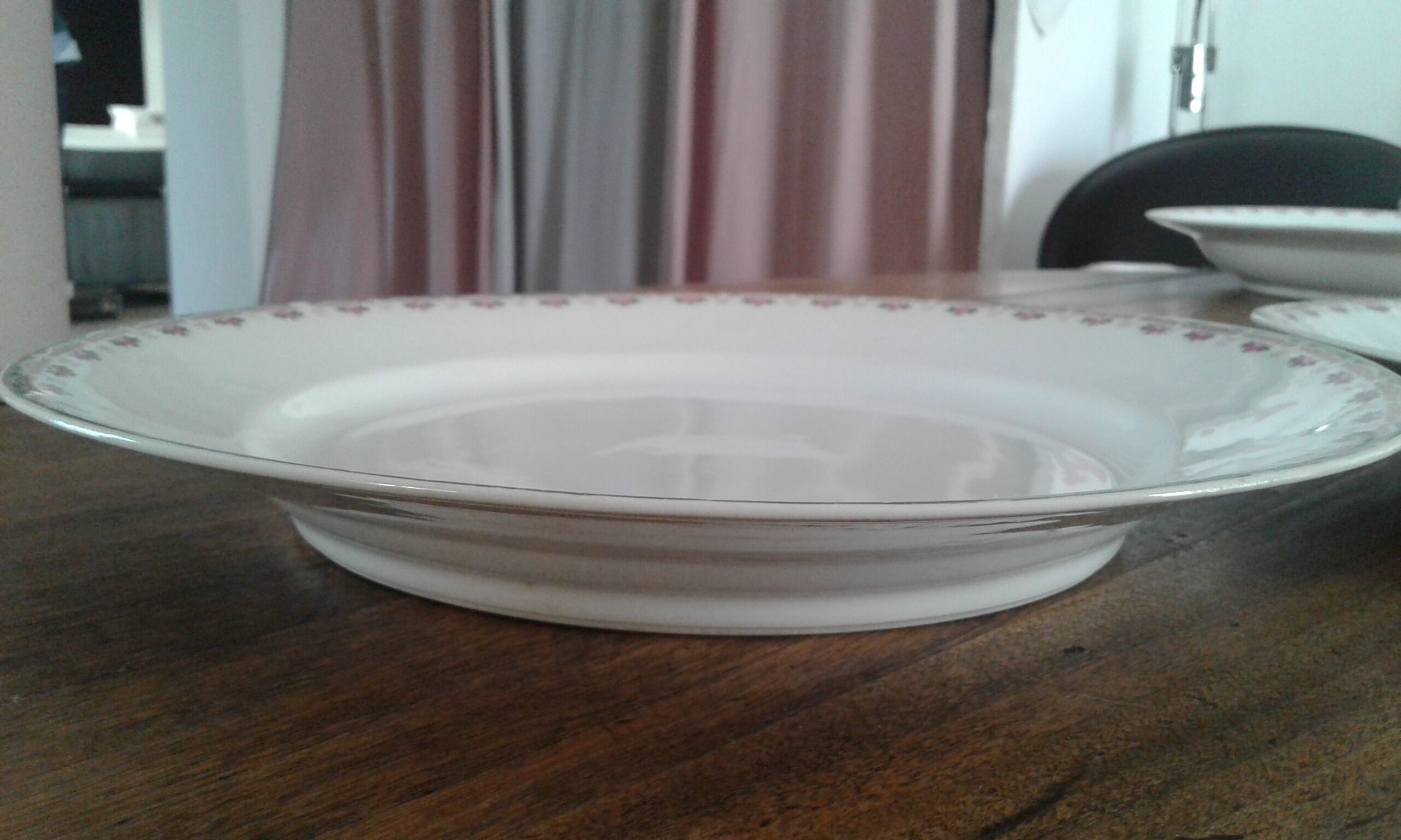 2 round dishes slightly hollow .porcelain Limoges