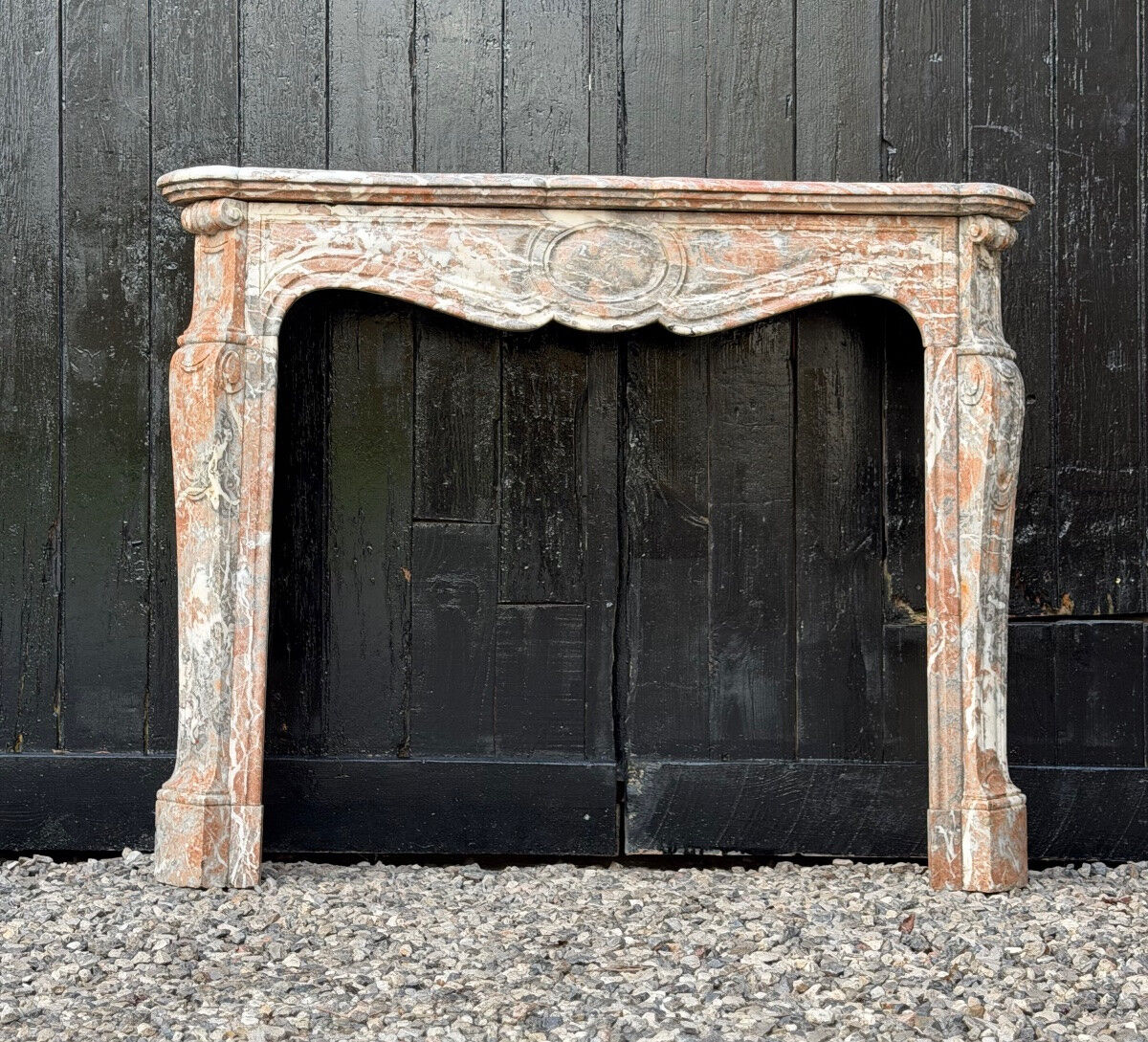 Louis XV style fireplace in grey Ardennes marble, circa 1900.