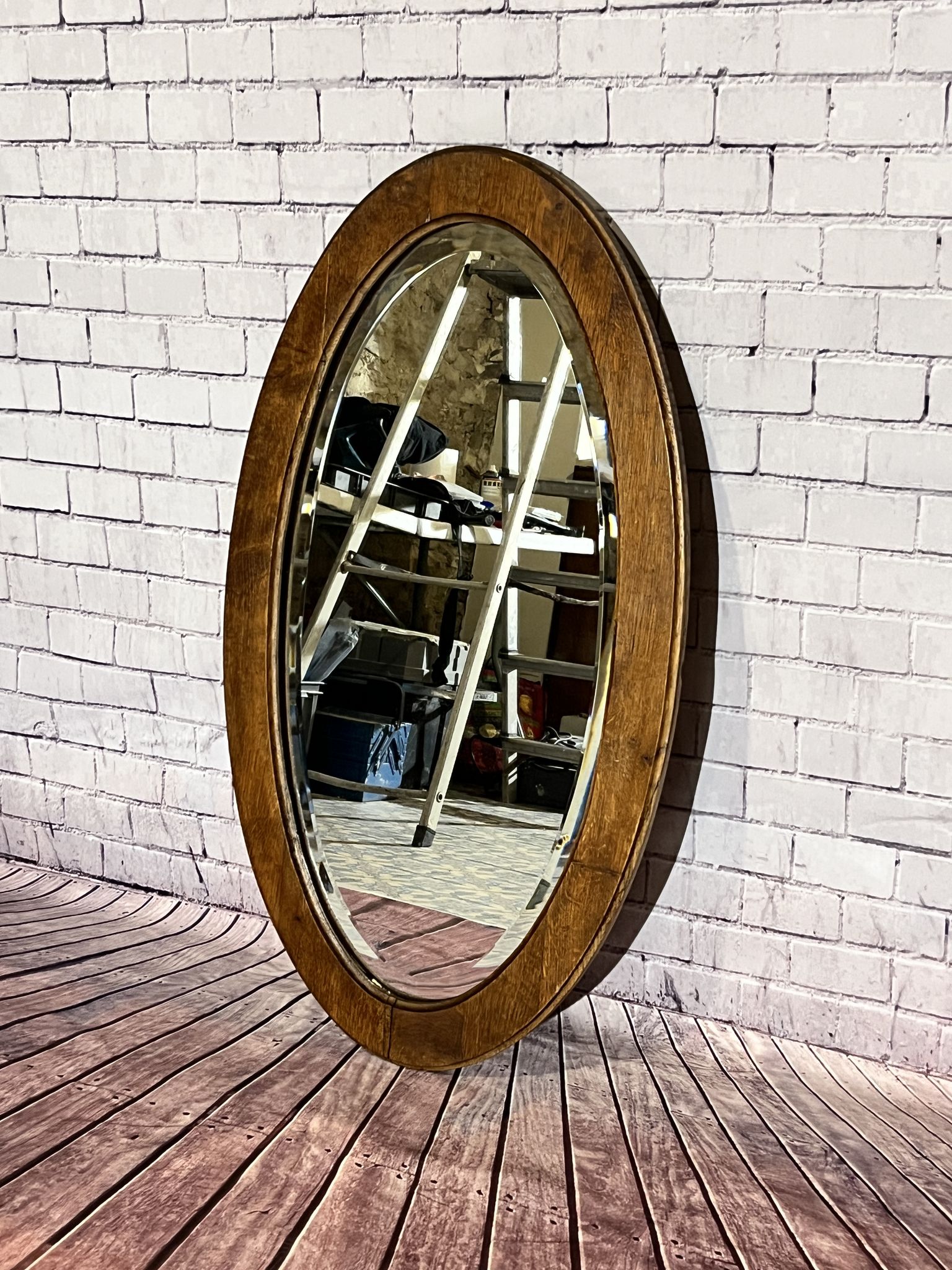 Oval beveled wooden mirror, 93x54 cm