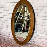 Oval beveled wooden mirror, 93x54 cm