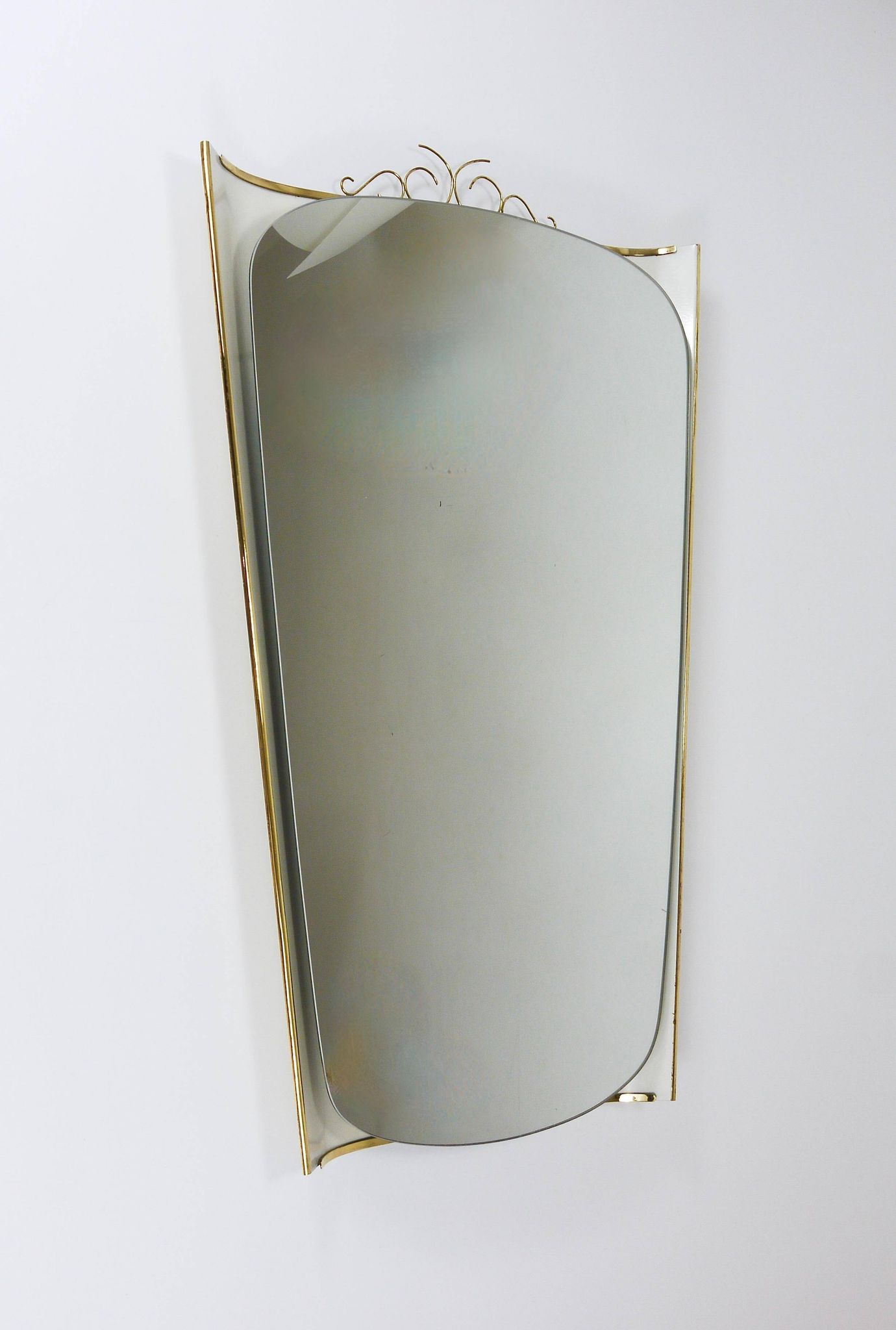 Mid-century illuminated wall mirror by Ernest Igl with brass crown, by Hillebrand.