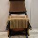 Fauteuil chauffeuse crapaud velours à franges style Napoléon III