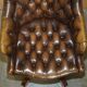 Fauteuil Chesterfield vintage en cuir vieilli