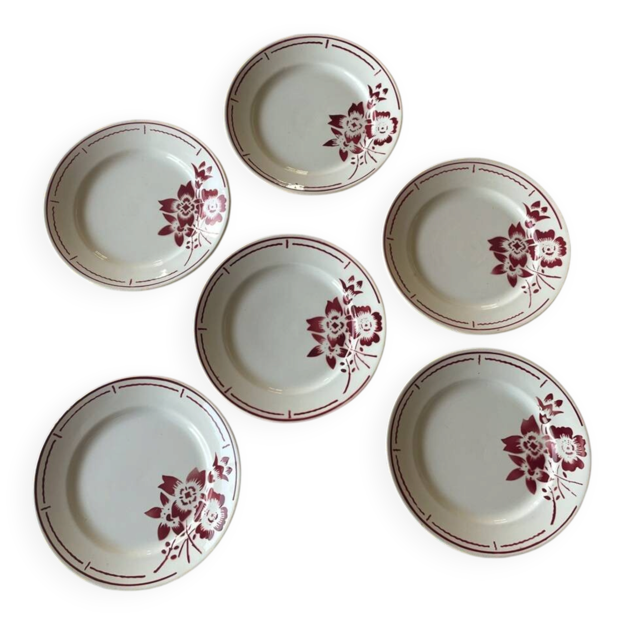 6 plates from the Badonviller pottery with a red flower design.