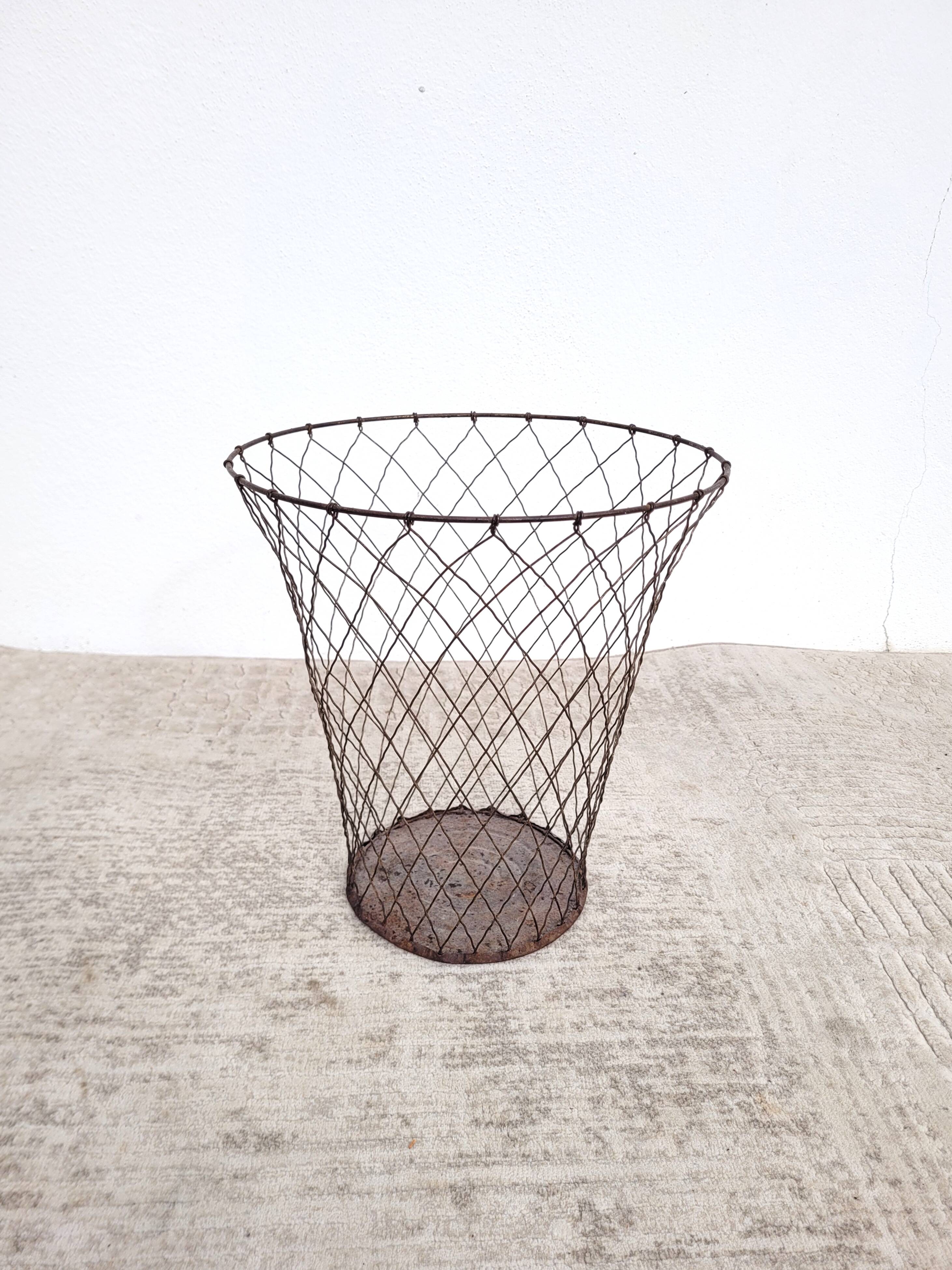 Old wire mesh wastebasket