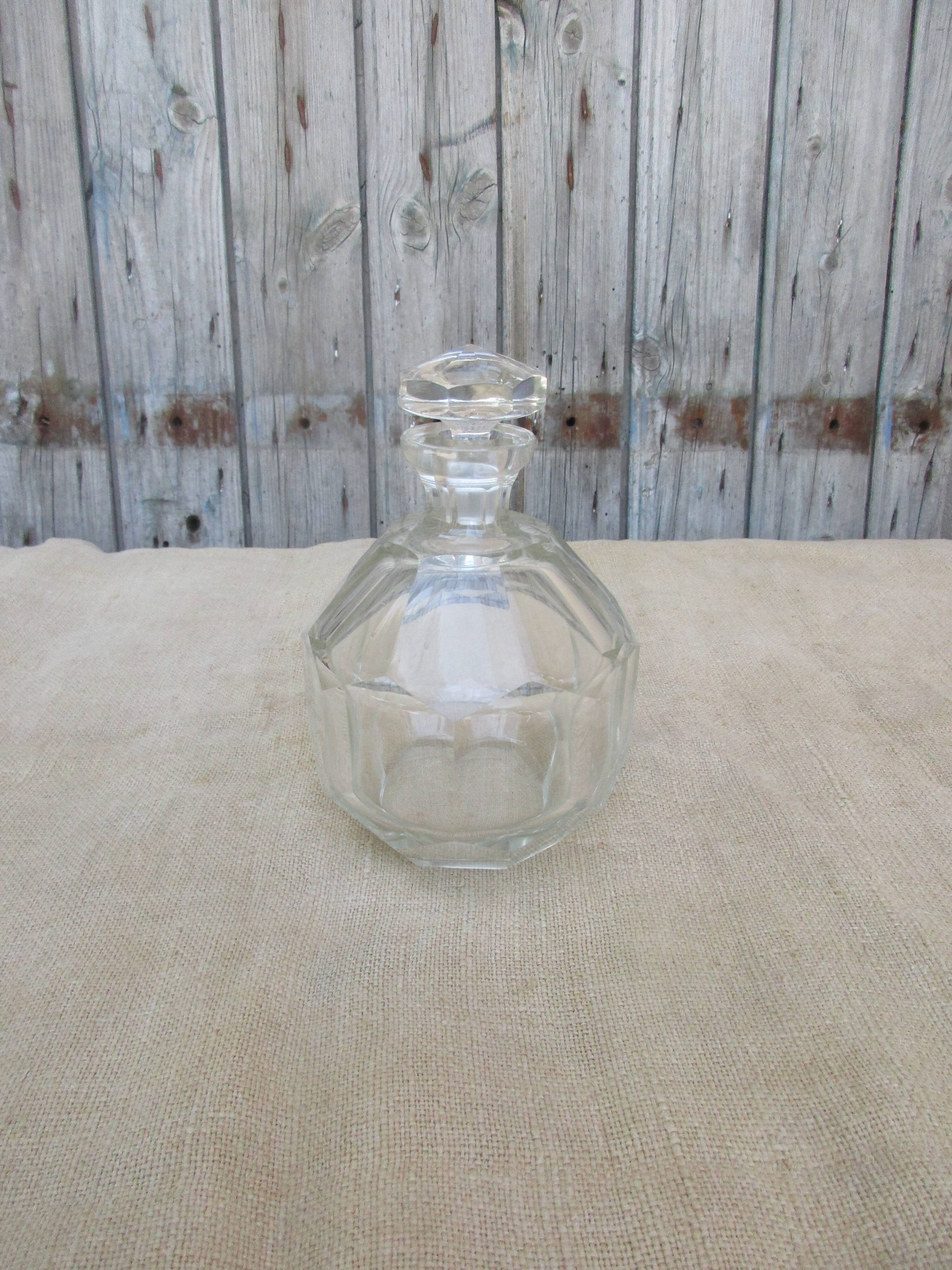Glass decanter and diamond tip emeri cap