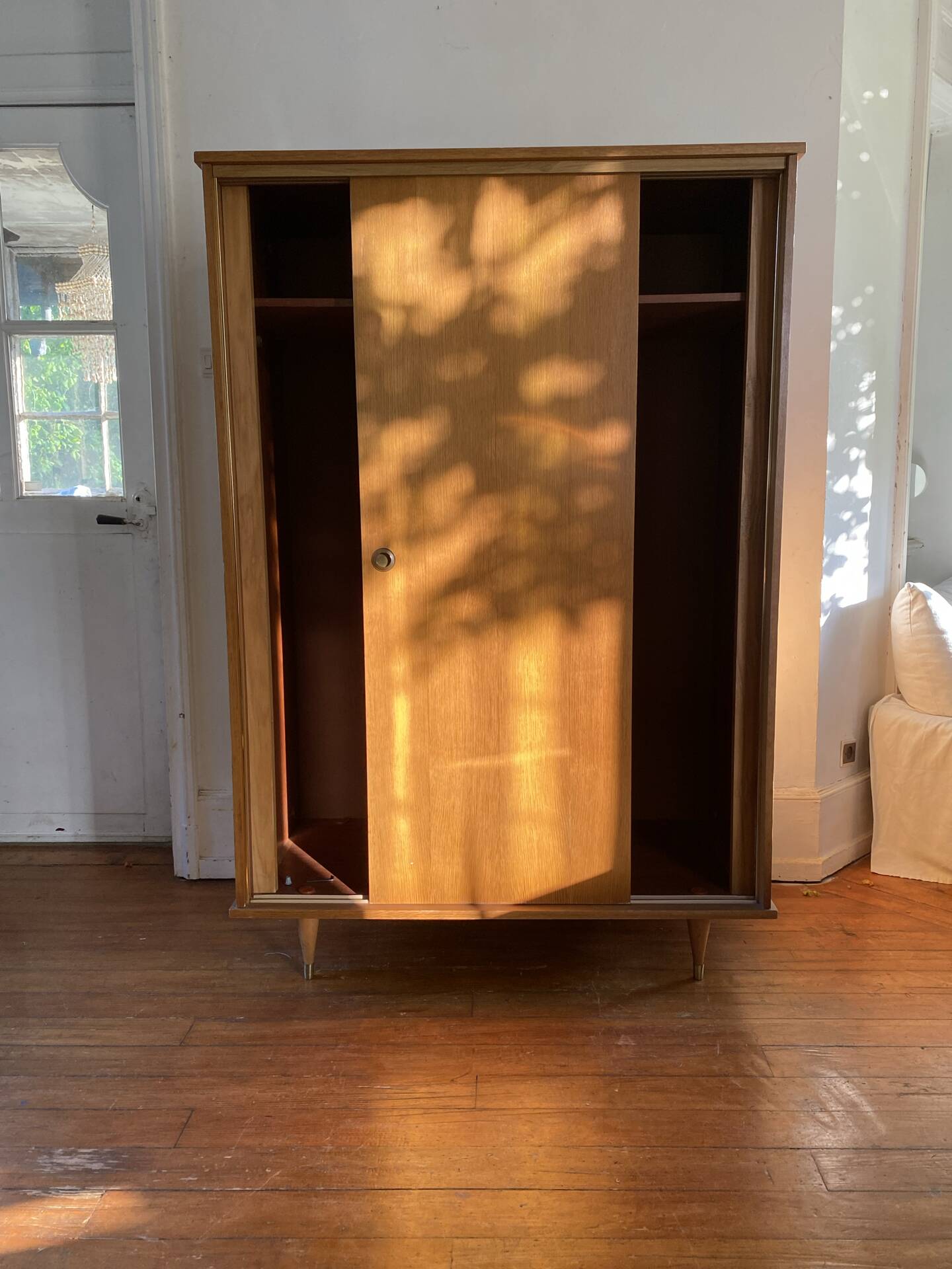 Large vintage Scandinavian wardrobe with two sliding doors.