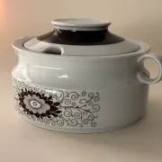 Porcelain soup tureen by Winterling, decorated with brown flowers.