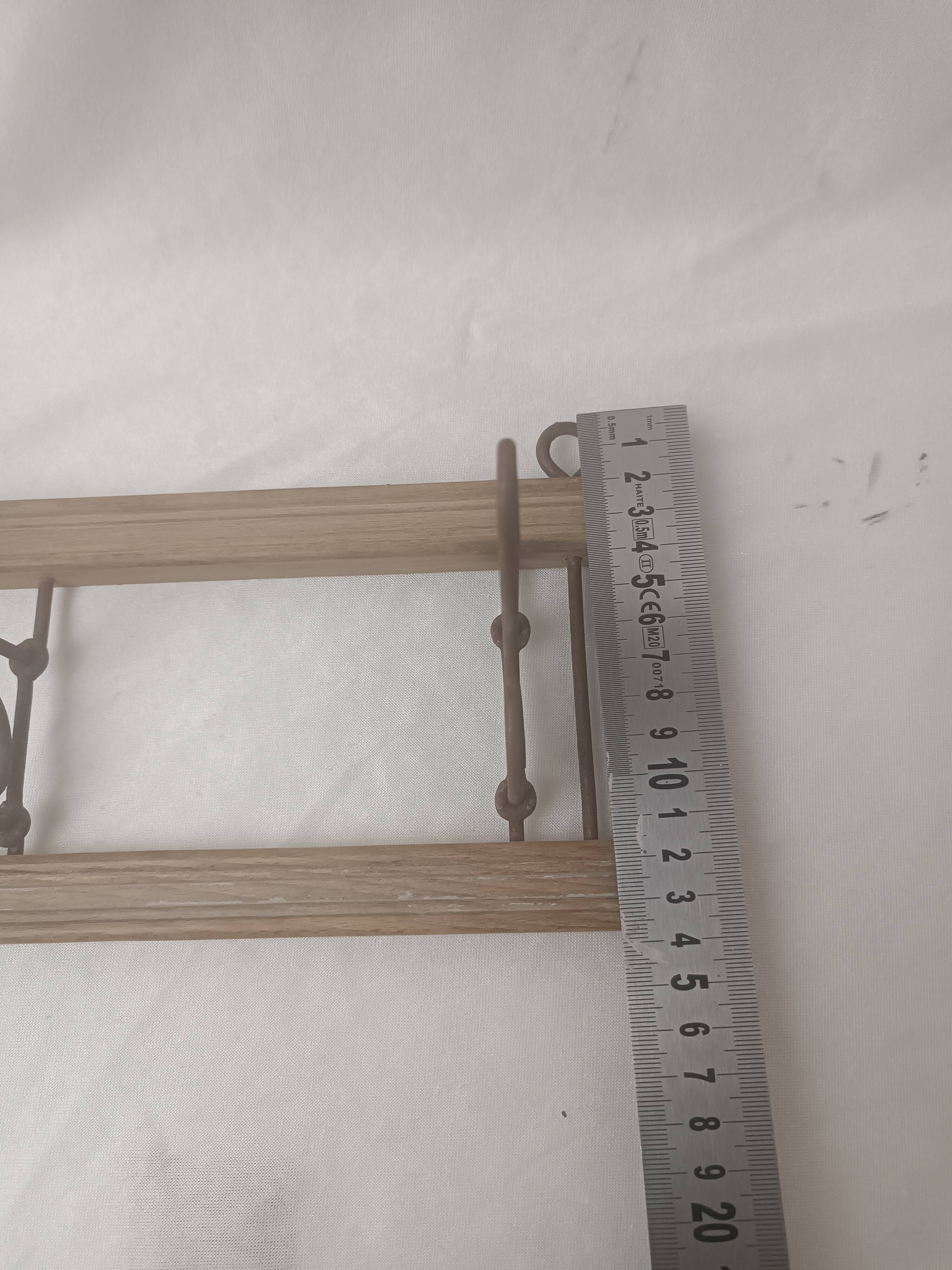 Coat rack/wood & iron hooks