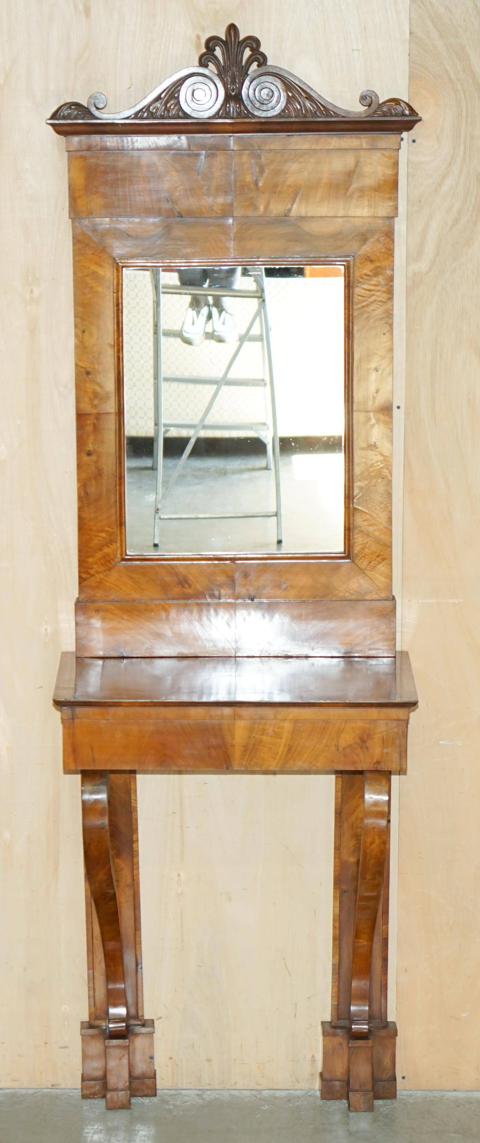 Pair of restored antique consoles from around 1815 in walnut, Regency style with mirror.