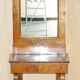 Pair of restored antique consoles from around 1815 in walnut, Regency style with mirror.