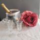 Twisted moulded glass bistro champagne bucket with a silver metal collar.