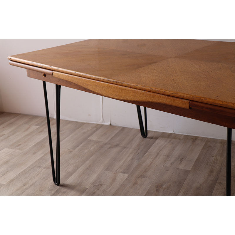Vintage extendable dining table in wood and metal base, 1950
