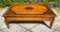 Tale basse vintage en bois massif et marqueterie de marbre