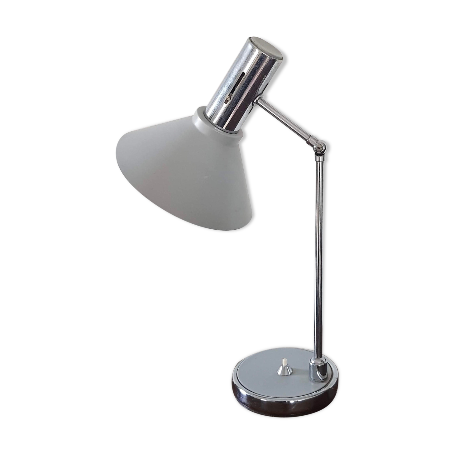 Chrome metal desk lamp and gray articulated arm