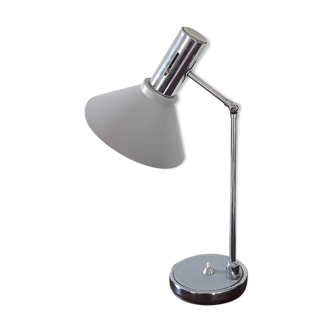Chrome metal desk lamp and gray articulated arm