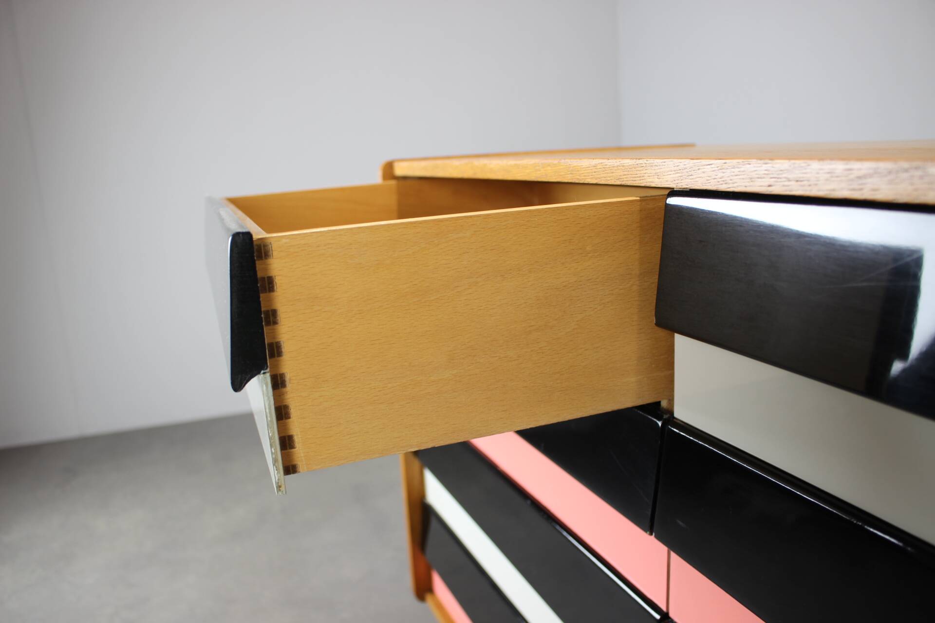 Restored 1960 chest of drawers by Jiroutek in oak with color-block drawers