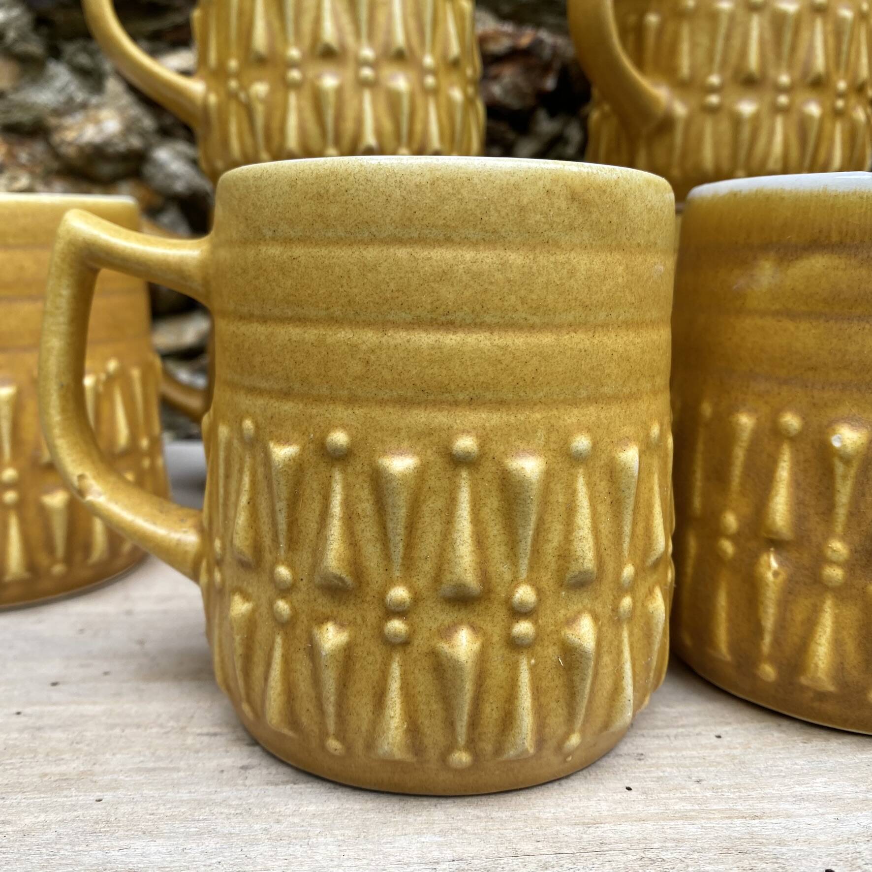 Vintage BP ceramic mugs from the 1970s.