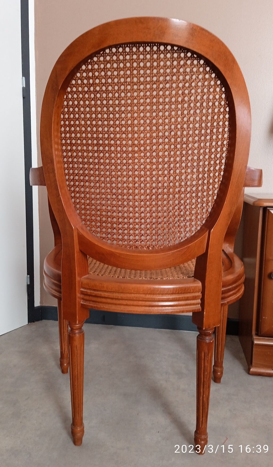 Antique Louis XVI style cane armchair