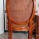 Antique Louis XVI style cane armchair