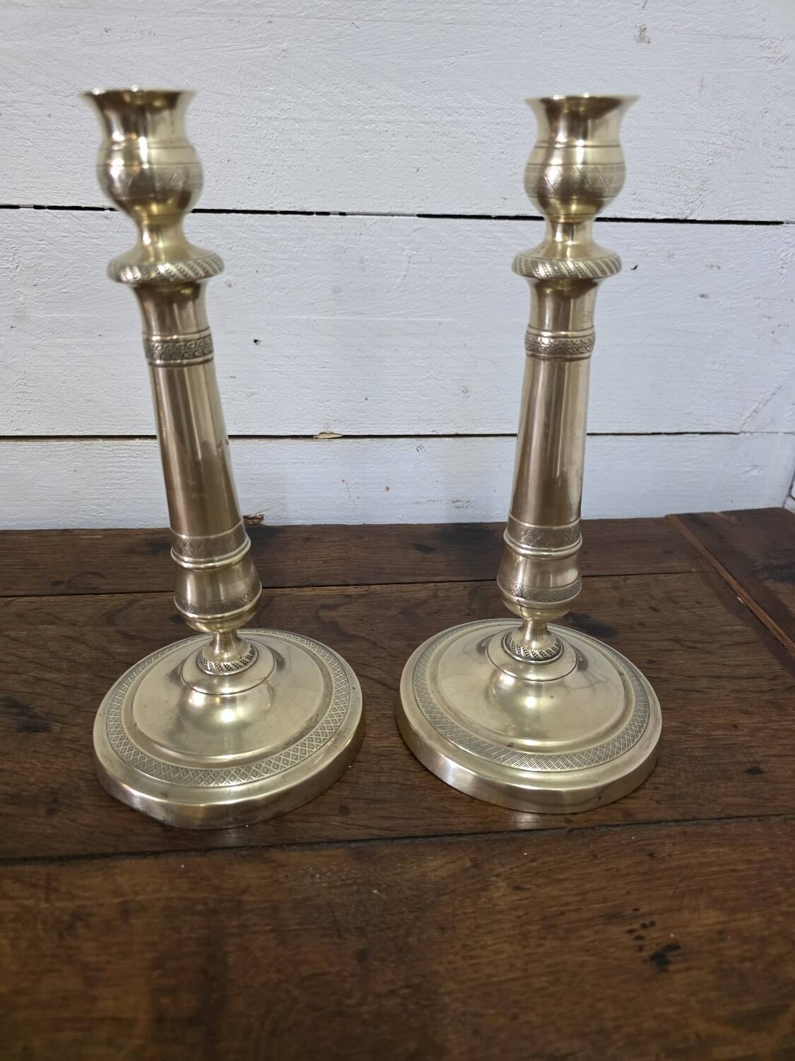 Antique pair of brass candlesticks