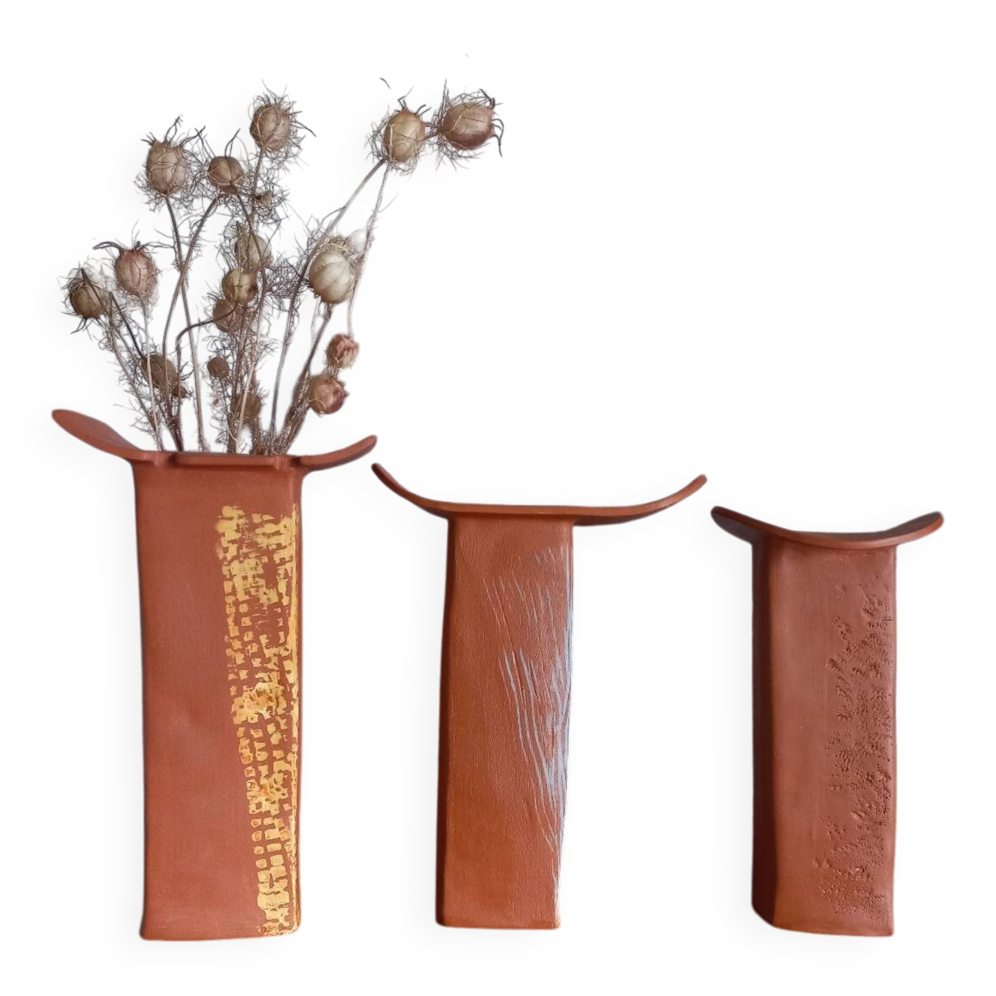 Trio of terracotta vases, unique pieces