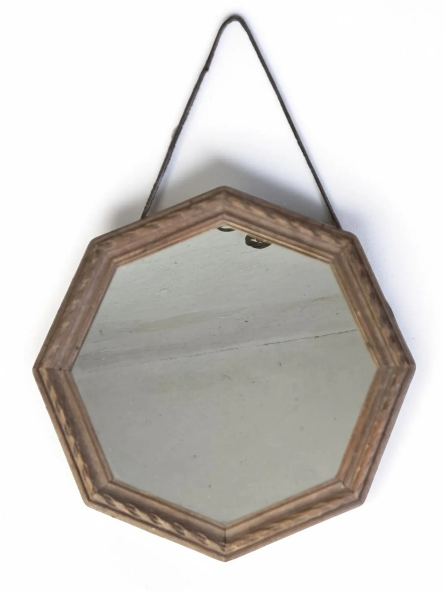 Octagonal mirror in carved wood