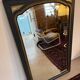 Miroir vintage glace biseautée en bois noir et doré