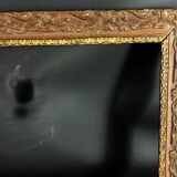 Old frame wood and stucco patinated and gilded