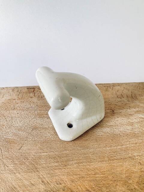 Enamelled earthen coat hook, 1900