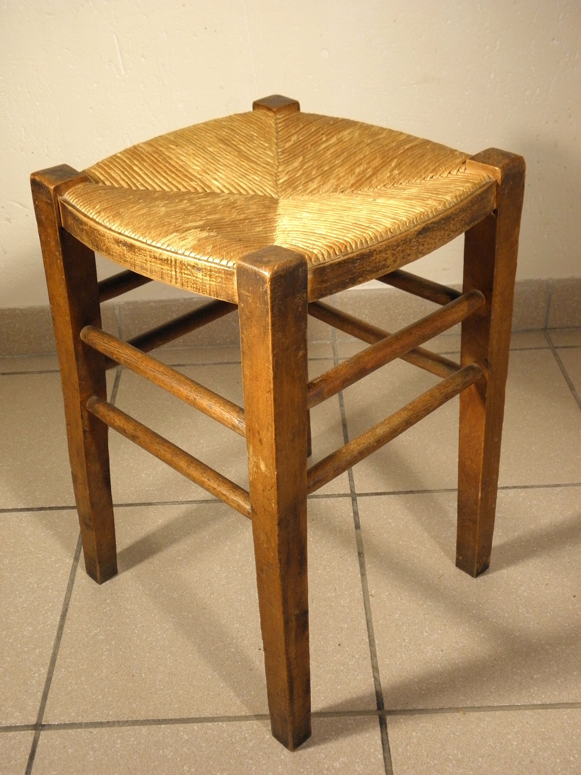 Wood and straw farm stool