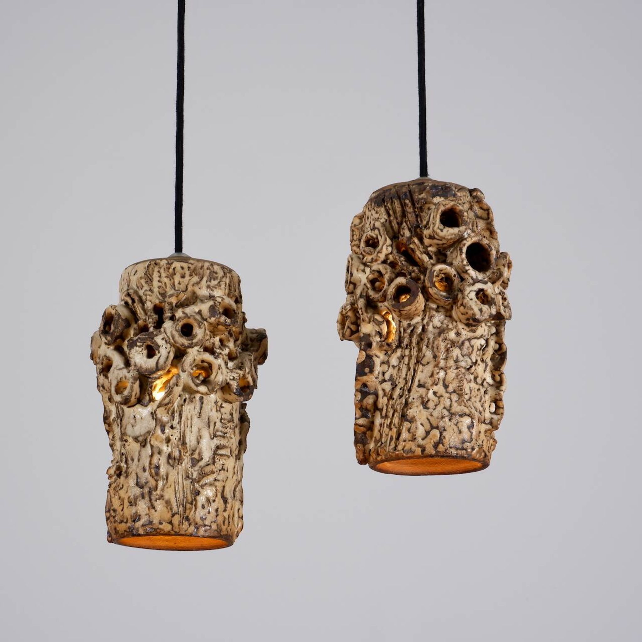 Sculptural ceramic pendant lamps by Bodil Marie Nielsen
