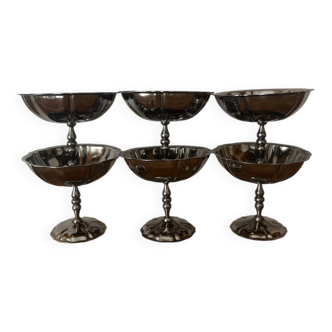Vintage set of 6 finely engraved stainless steel bowls.