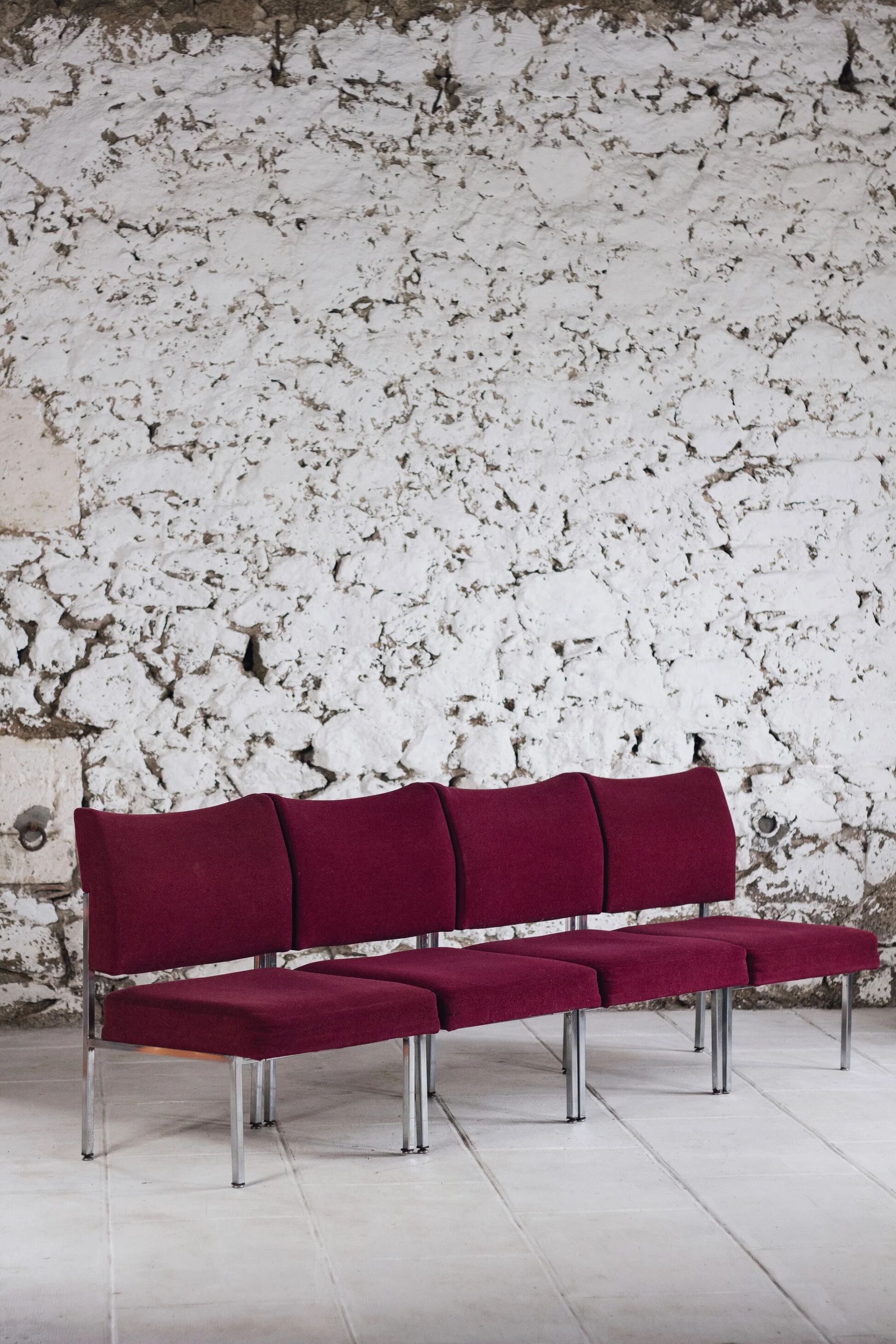 Set of 4 modernist burgundy armchairs, 1970.