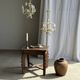 Small vintage cream metal flower chandelier with orange flowers and 3 arms.